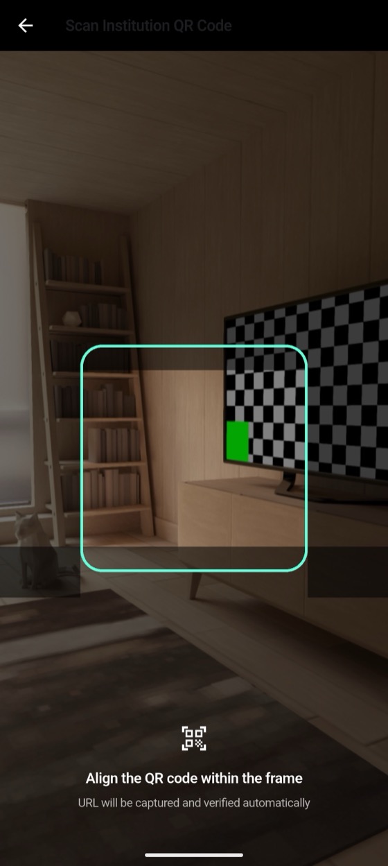The QR scanner screen with the camera open